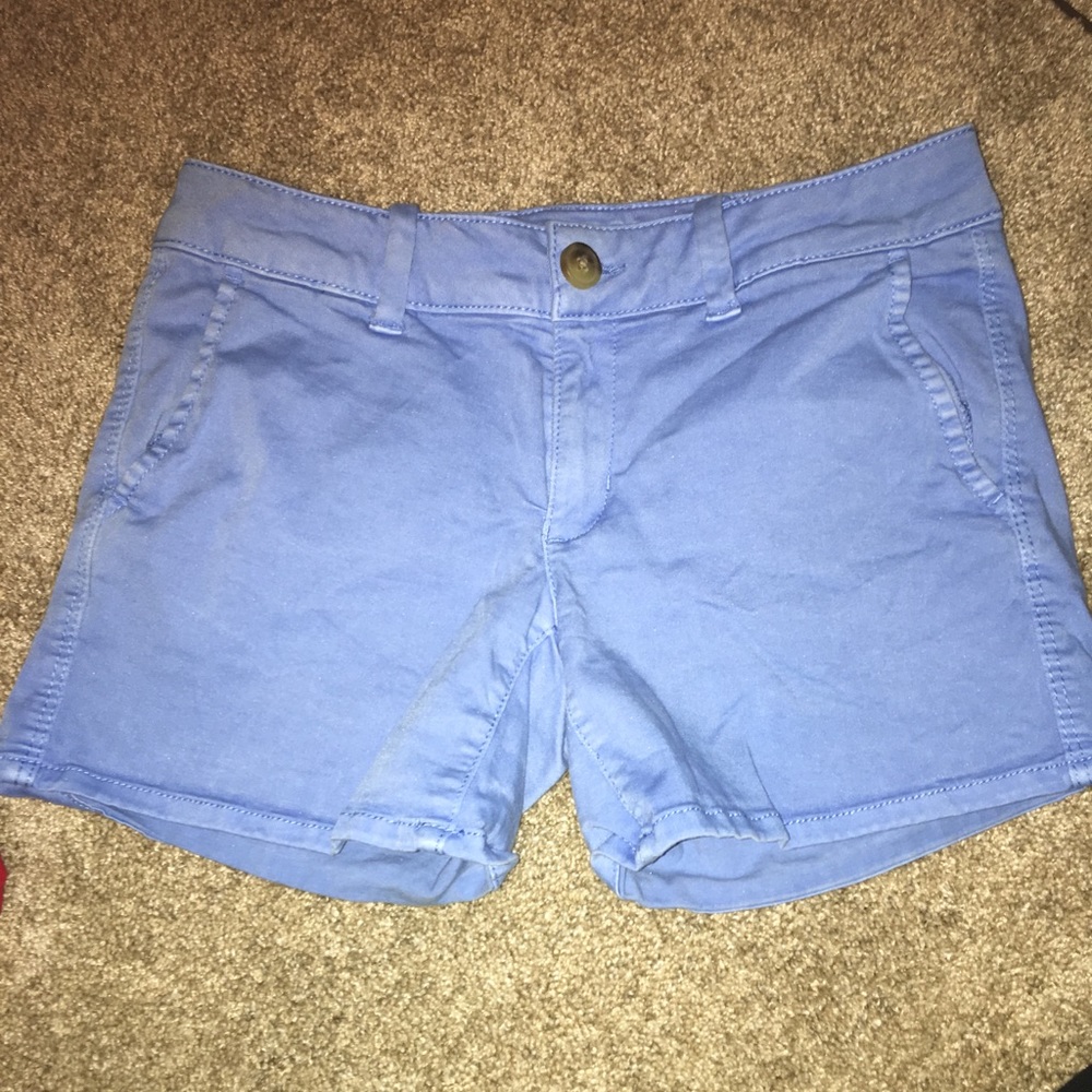 light blue mid length jean shorts